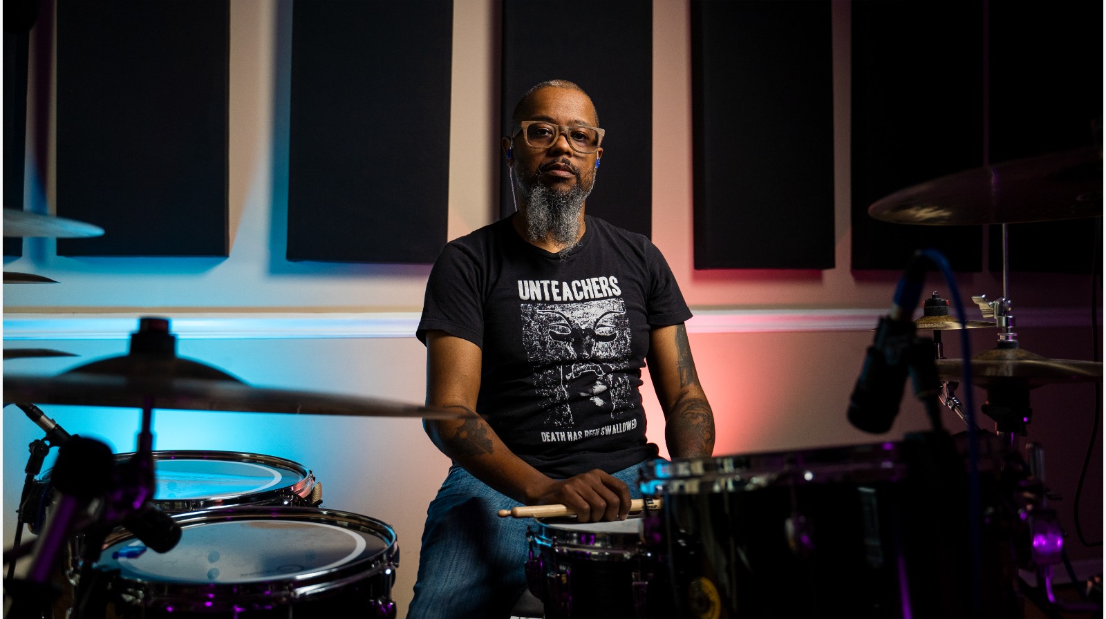 myk robinson sitting at a drum set